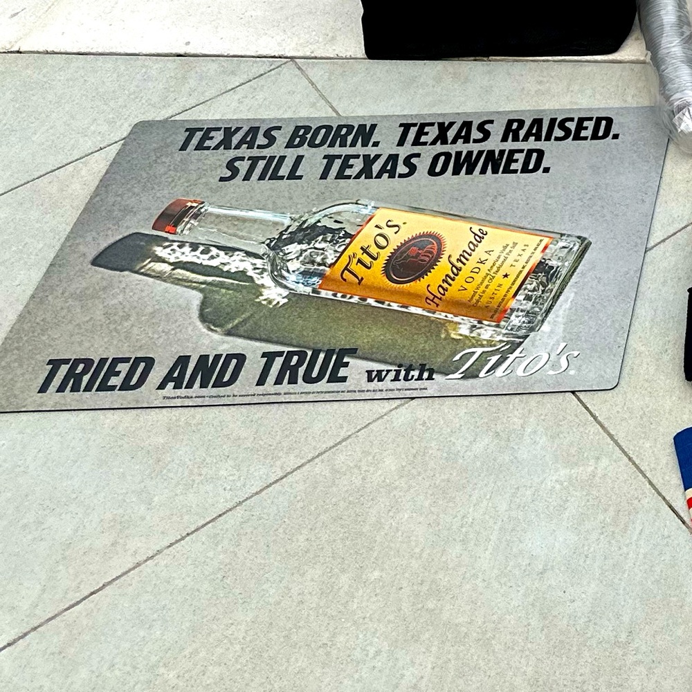 Tito’s logo bar rug table mat